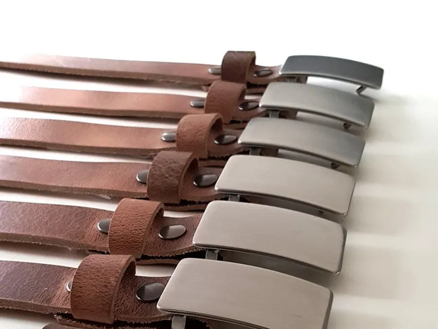 An Iron Art hand-forged belt and buckle set